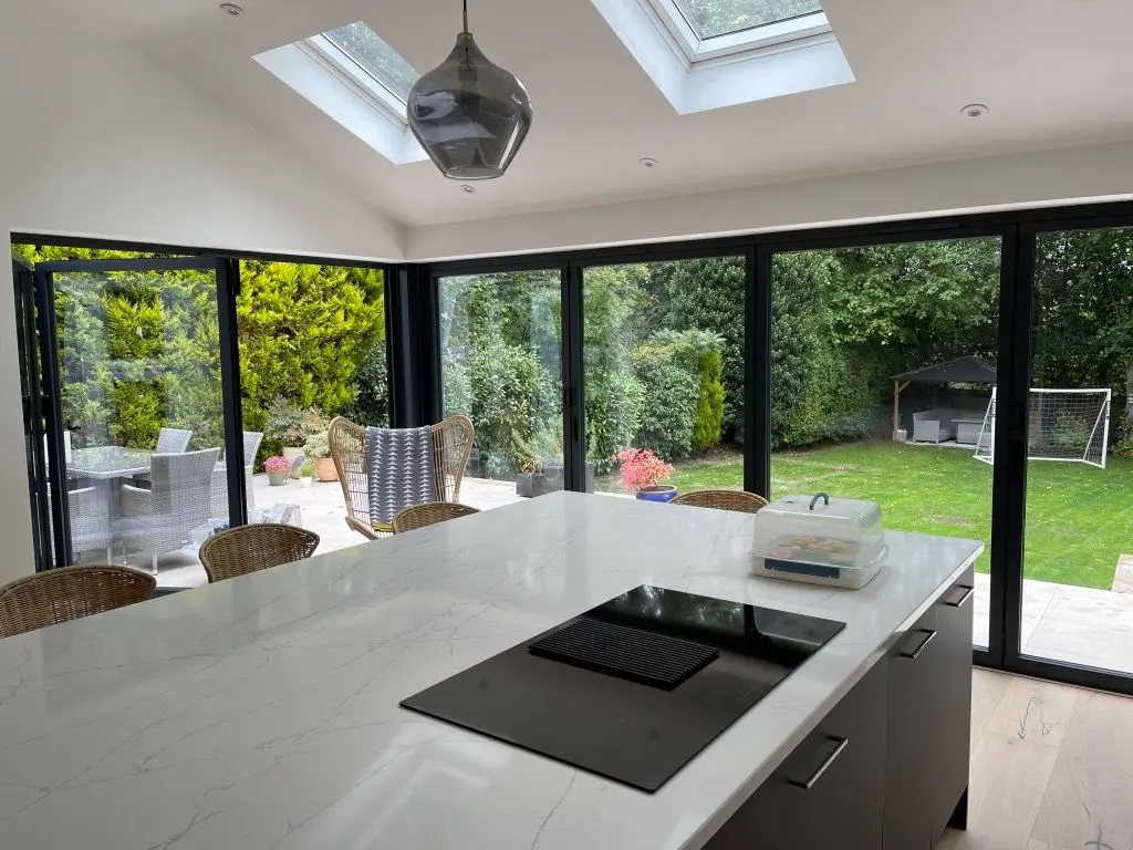 Finished open-plan kitchen extension overlooking a Surrey garden